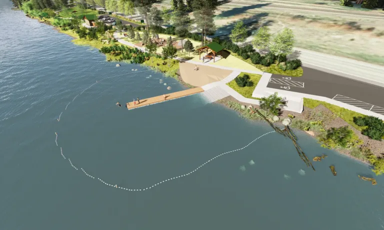 Aerial rendering of a lakeside park with a sandy beach, roped-off swim area and wooden dock, swimmers in the water, a pavilion with picnic tables, walking paths through landscaped trees, and an adjacent parking lot with accessible spaces.