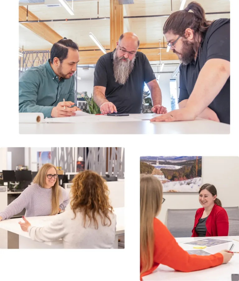 Colleagues collaborating in a modern open office, discussing documents around tables in small groups.